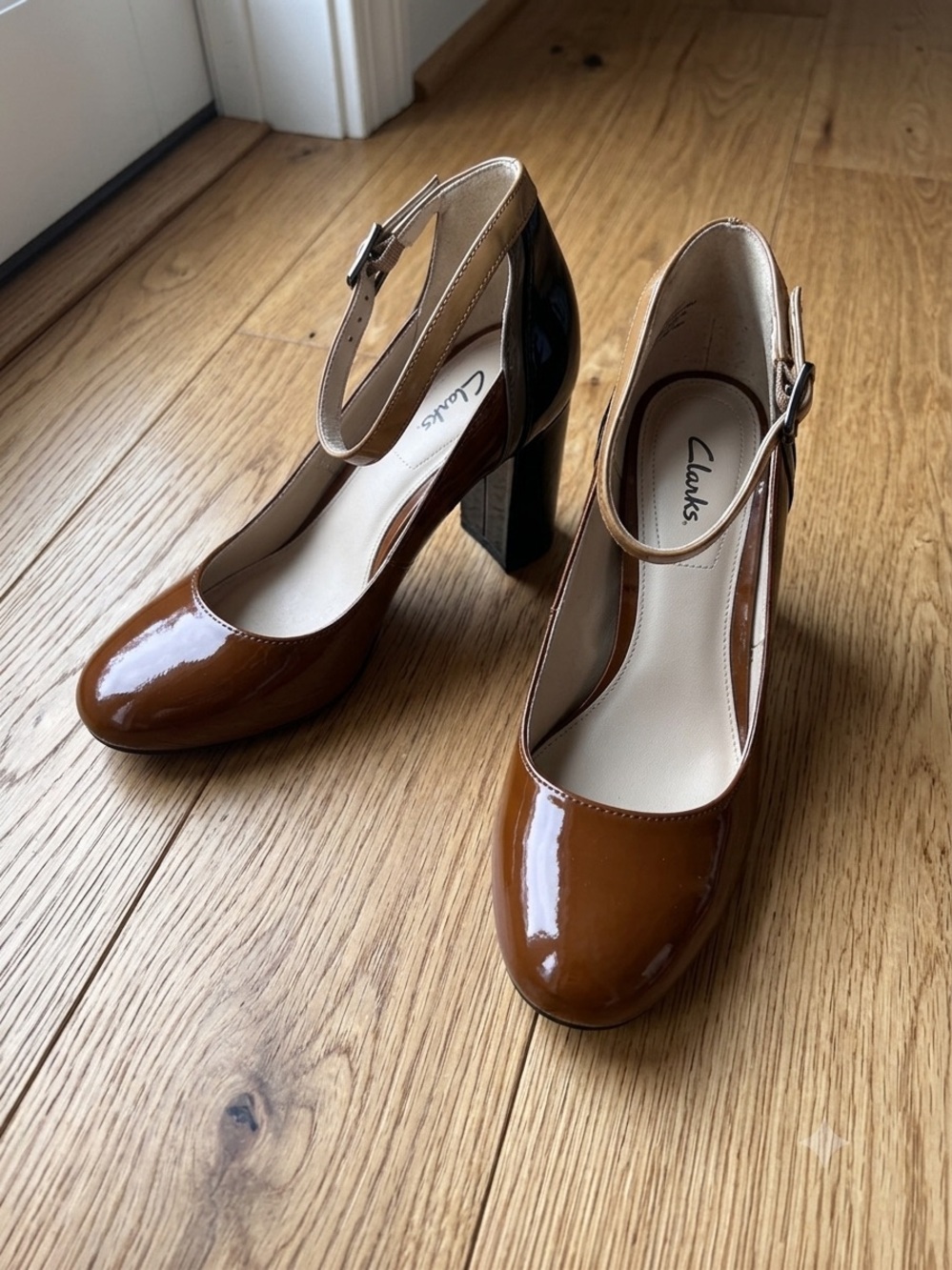 Clarks Brown Patent Leather Pumps with Cream Cross-Strap and Navy Heel